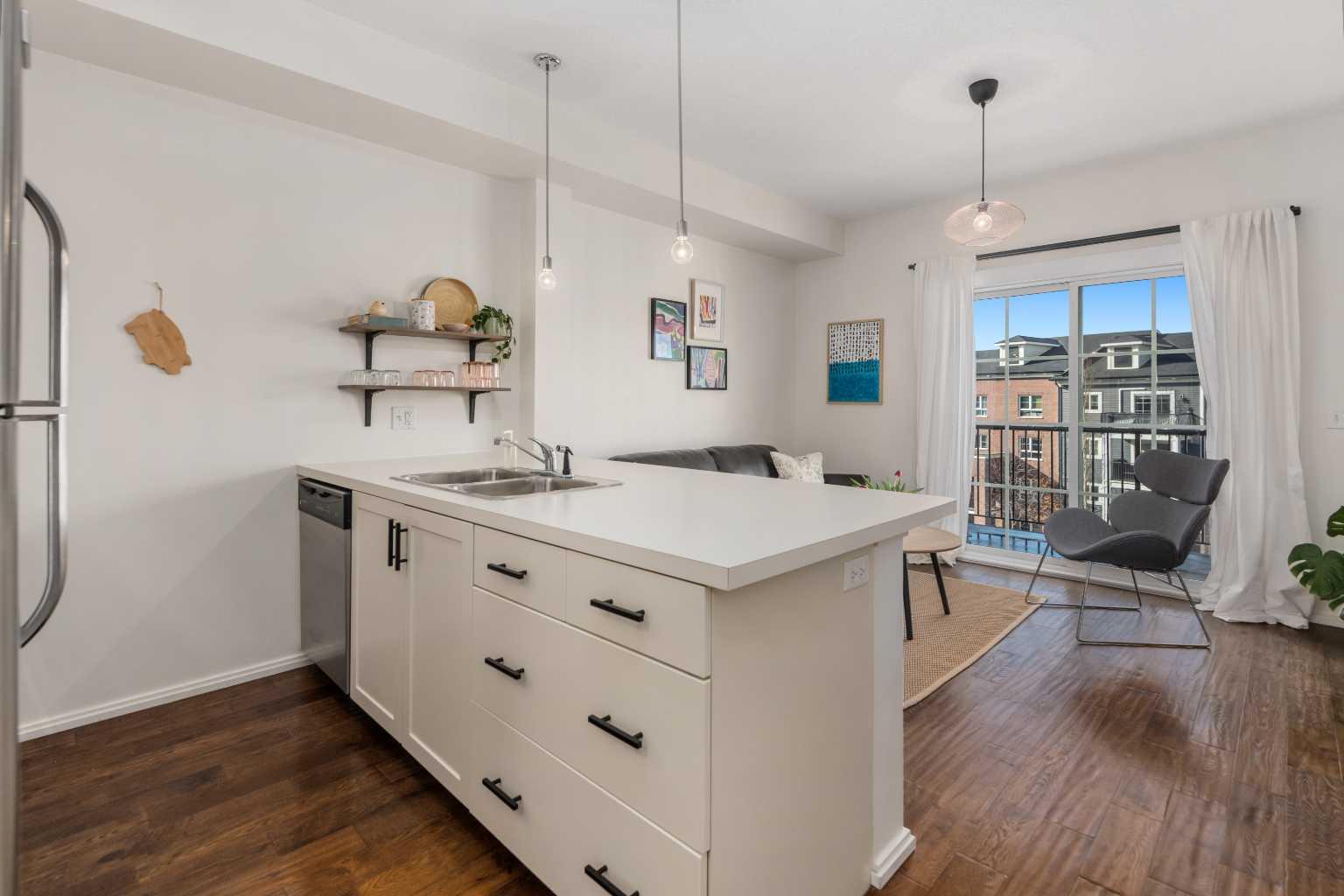 1403, 279 Copperpond Common SE, T2Z 1C6