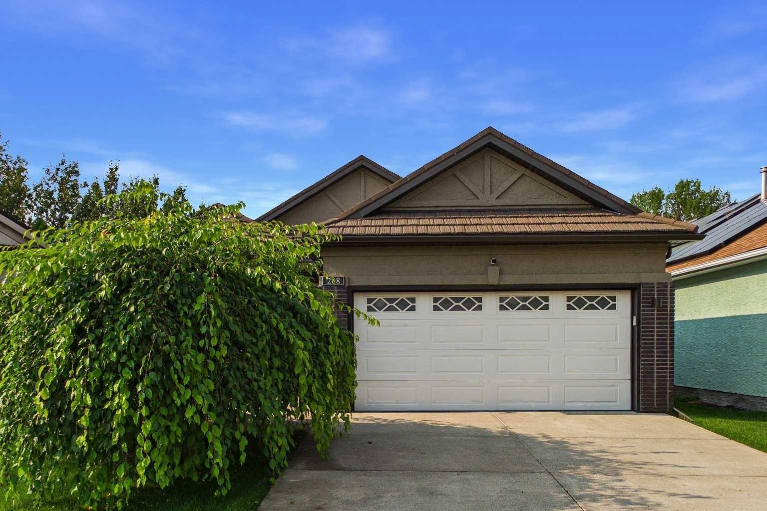 208 Harvest Lake Green NE, T3K 4K9